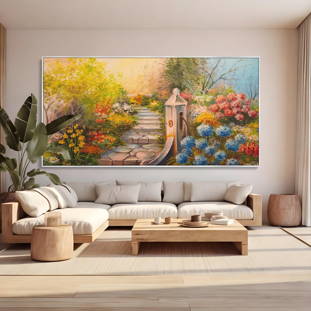 Tablou canvas cu pictura decorativa cu alee florala si fantana, in rama de aluminiu argintiu, pe perete intr-un living